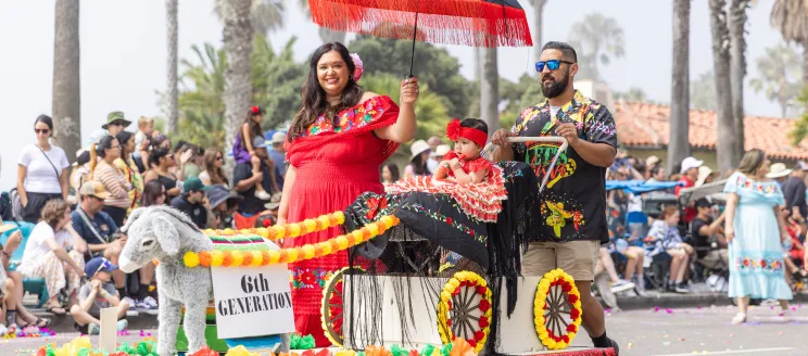 A family and their handmade float at the Children’s Fiesta Parade.