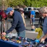 Men check out reels