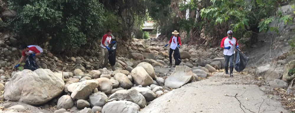 Volunteers pickup trash in Mission Creek