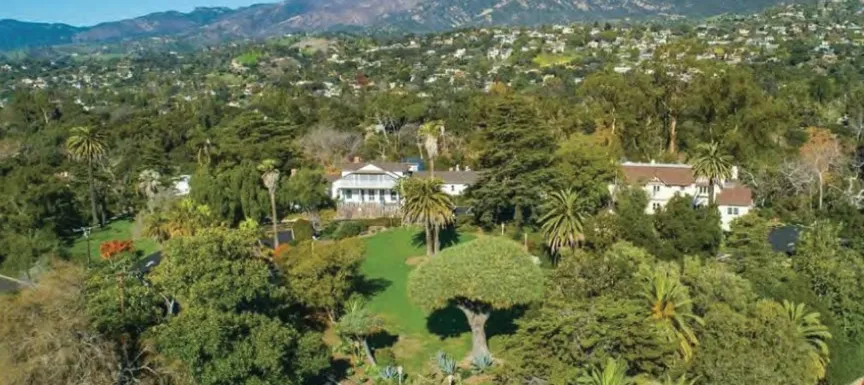 505 E Los Olivos Street. Photo of house and property on hill.