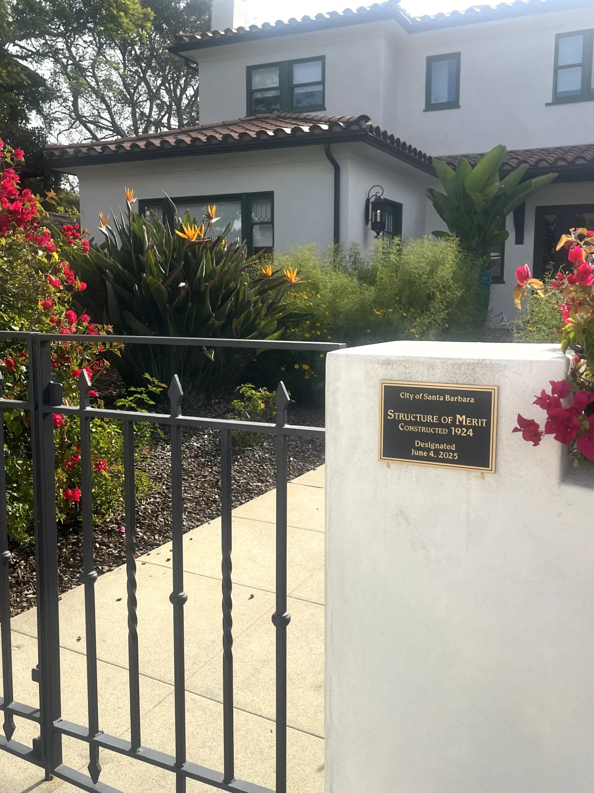 Plaque at 20 East Los Olivos front gate