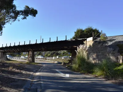 Photo of the historic Los Patos Union Pacific Railroad Bridge facing the US 101 Freeway offramp 